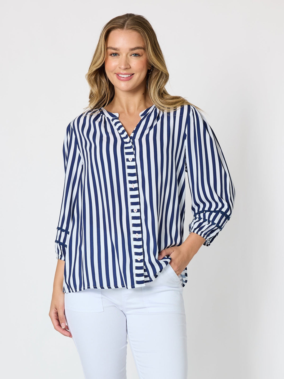Image of a model wearing Tops. Product name - Montecito Stripe Print Top Navy/White in Navy/White colour by brand - Threadz