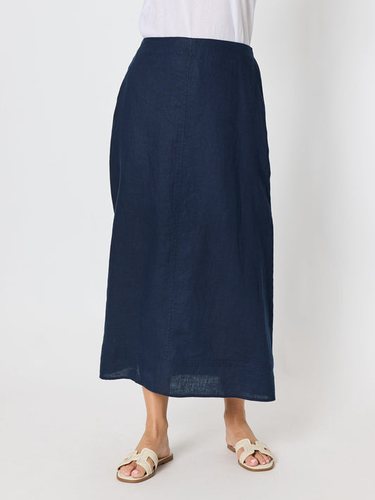 Image of a model wearing Skirts. Product name - Amy Linen Maxi Skirt Navy in Navy colour by brand - Gordon Smith