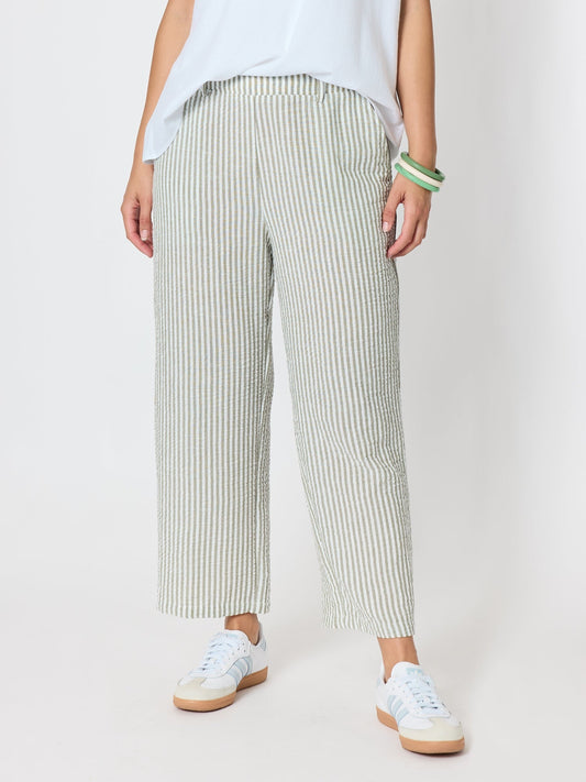 Image of a model wearing Pants. Product name - Urban Stripe Print Pant Olive White in Olive White colour by brand - Threadz