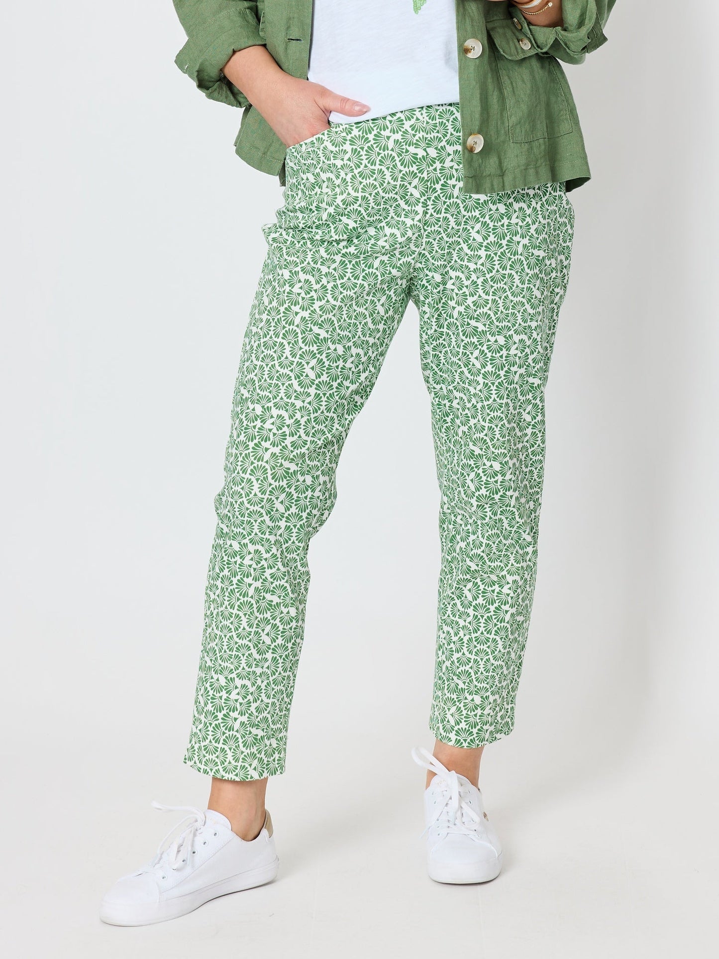 Image of a model wearing Pants. Product name - Oasis Print Slim Leg Pant Fern White in Fern White colour by brand - Gordon Smith