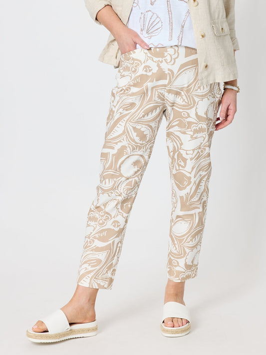 Image of a model wearing Pants. Product name - Tuscan Bloom Print Pant Latte White in Latte White colour by brand - Gordon Smith