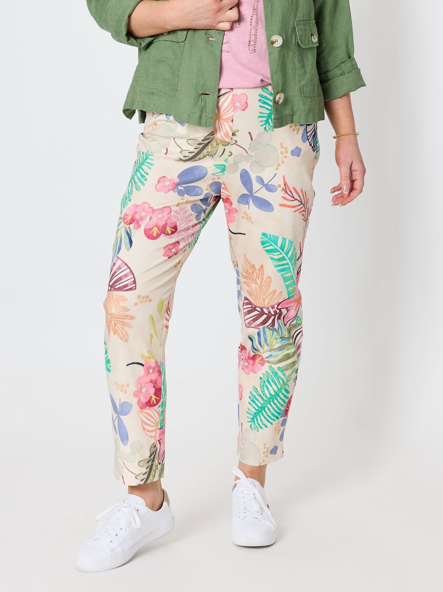 Image of a model wearing Pants. Product name - Desert Rose Floral Print Slim Leg Pant Pink/Multi in Pink/Multi colour by brand - Gordon Smith