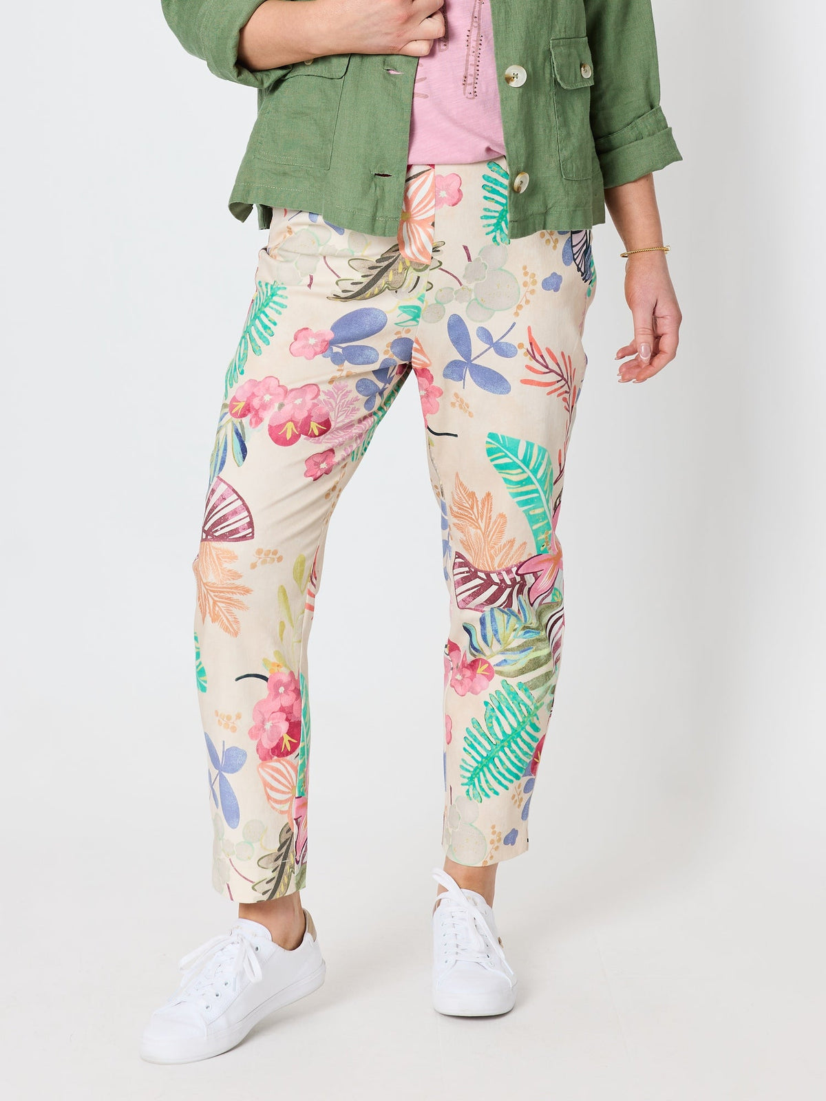 Image of a model wearing Pants. Product name - Desert Rose Floral Print Slim Leg Pant Pink/Multi in Pink/Multi colour by brand - Gordon Smith