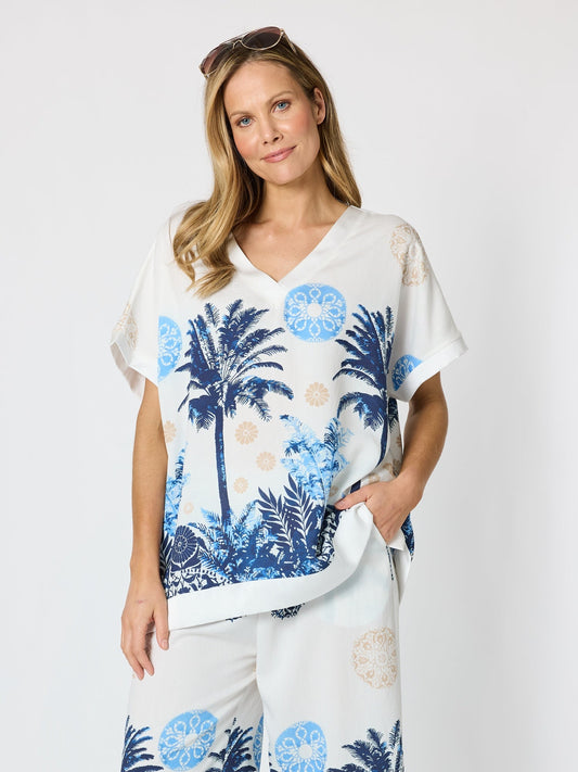 Image of a model wearing Tops. Product name - Escape Print Top Azure Multi in Azure Multi colour by brand - Clarity