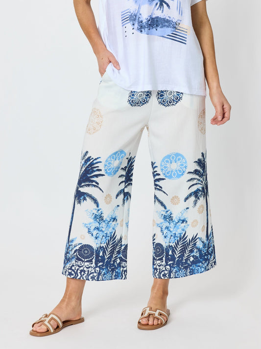 Image of a model wearing Pants. Product name - Escape Print Wide Leg Pant Azure Multi in Azure Multi colour by brand - Clarity