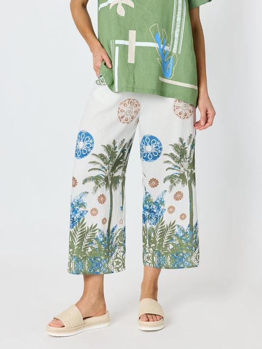 Image of a model wearing Pants. Product name - Escape Print Wide Leg Pant Fern Multi in Fern Multi colour by brand - Clarity