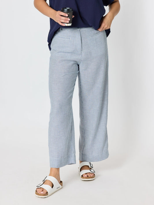 Image of a model wearing Pants. Product name - City Stripe Print Straight Leg Pant Navy/White in Navy/White colour by brand - Threadz