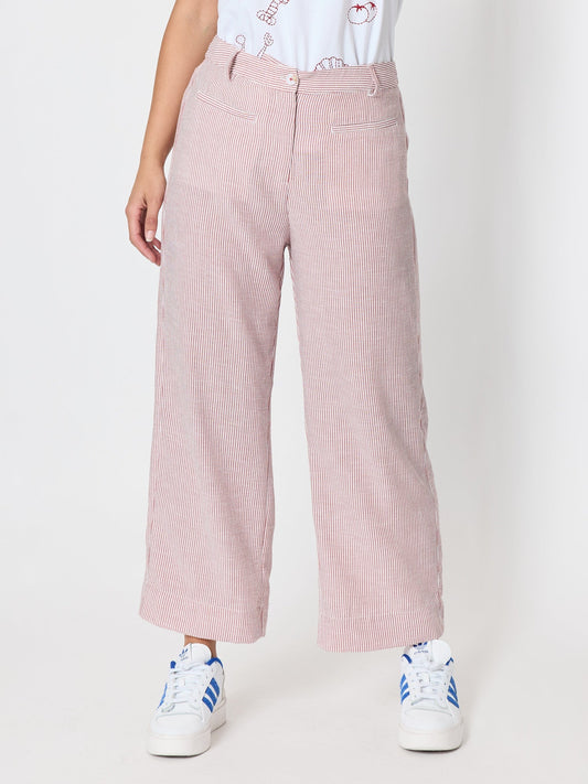 Image of a model wearing Pants. Product name - City Stripe Print Straight Leg Pant Red White in Red White colour by brand - Threadz
