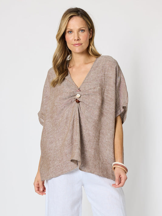 Image of a model wearing Tops. Product name - Haven Breeze Linen Top Mocha in Mocha colour by brand - Hammock & Vine