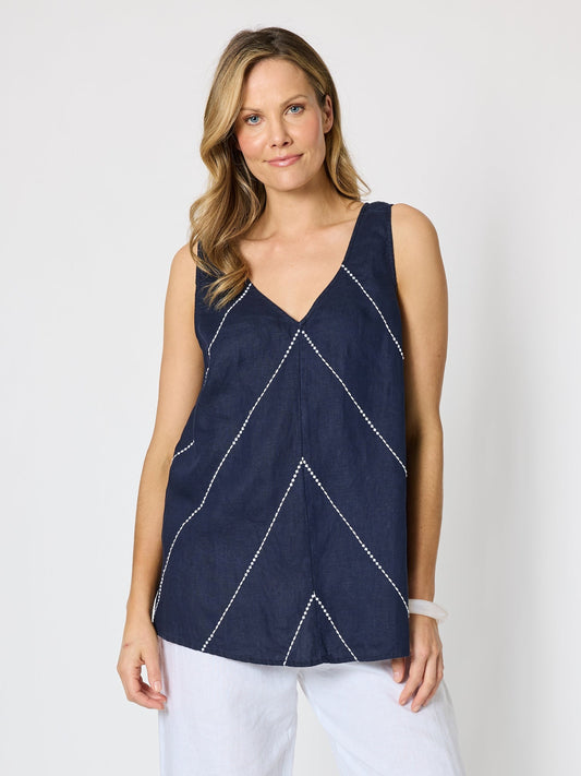 Image of a model wearing Tops. Product name - Haven Chevron Stitch Linen Cami Navy/White in Navy/White colour by brand - Hammock & Vine