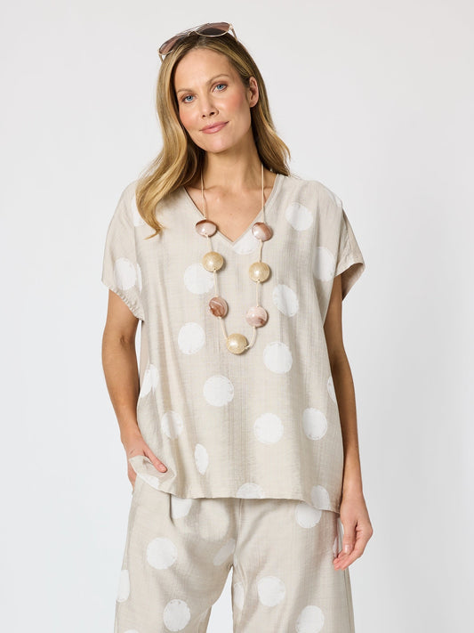 Image of a model wearing Tops. Product name - Riviera Spot Print Top Natural/White in Natural/White colour by brand - Clarity