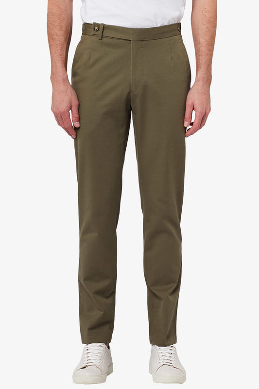 Image of a model wearing Pants. Product name - Friday Olive Chino in Olive colour by brand - Anthony Squires