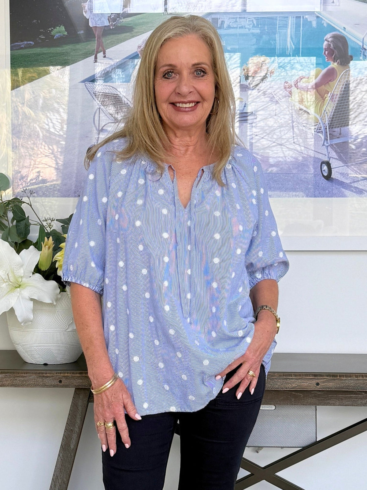 Image of a model wearing Tops. Product name - Monaco Embroidered Spot Top Pale Blue in Pale Blue colour by brand - Gordon Smith