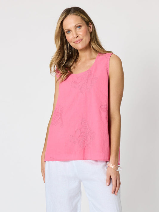 Image of a model wearing Tops. Product name - Lagoon Floral Palm Embroidered Cami Raspberry in Raspberry colour by brand - Threadz