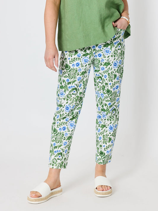 Image of a model wearing Pants. Product name - Bayside Floral Print Slim Leg Pant Fern Multi in Fern Multi colour by brand - Gordon Smith