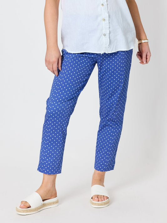 Image of a model wearing Pants. Product name - Shell Print Pant Azure in Azure colour by brand - Gordon Smith