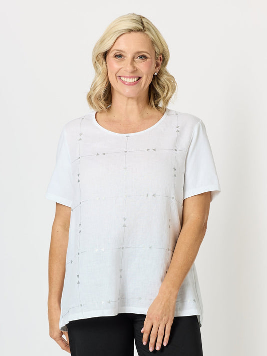 Image of a model wearing Tops. Product name - Silver Jewel Print Top White/Silver in White/Silver colour by brand - Clarity