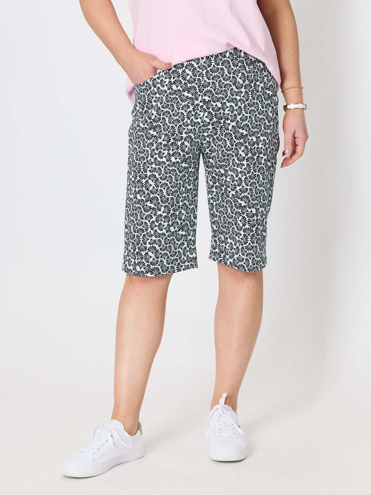 Image of a model wearing Shorts. Product name - Oasis Print Short Navy/White in Navy/White colour by brand - Gordon Smith