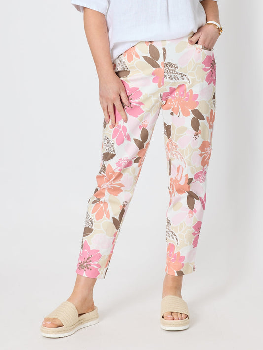 Image of a model wearing Pants. Product name - Amalfi Floral Rose Print Slim Leg Pant Pink/Multi in Pink/Multi colour by brand - Gordon Smith