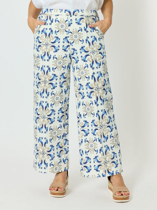Image of a model wearing Pants. Product name - Portofino Print Wide Leg Pant Cornflower Multi in Cornflower Multi colour by brand - Hammock & Vine
