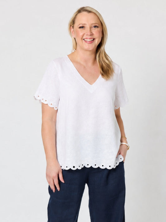 Image of a model wearing Tops. Product name - Lilly Scallop Hem Linen Top White in White colour by brand - Gordon Smith