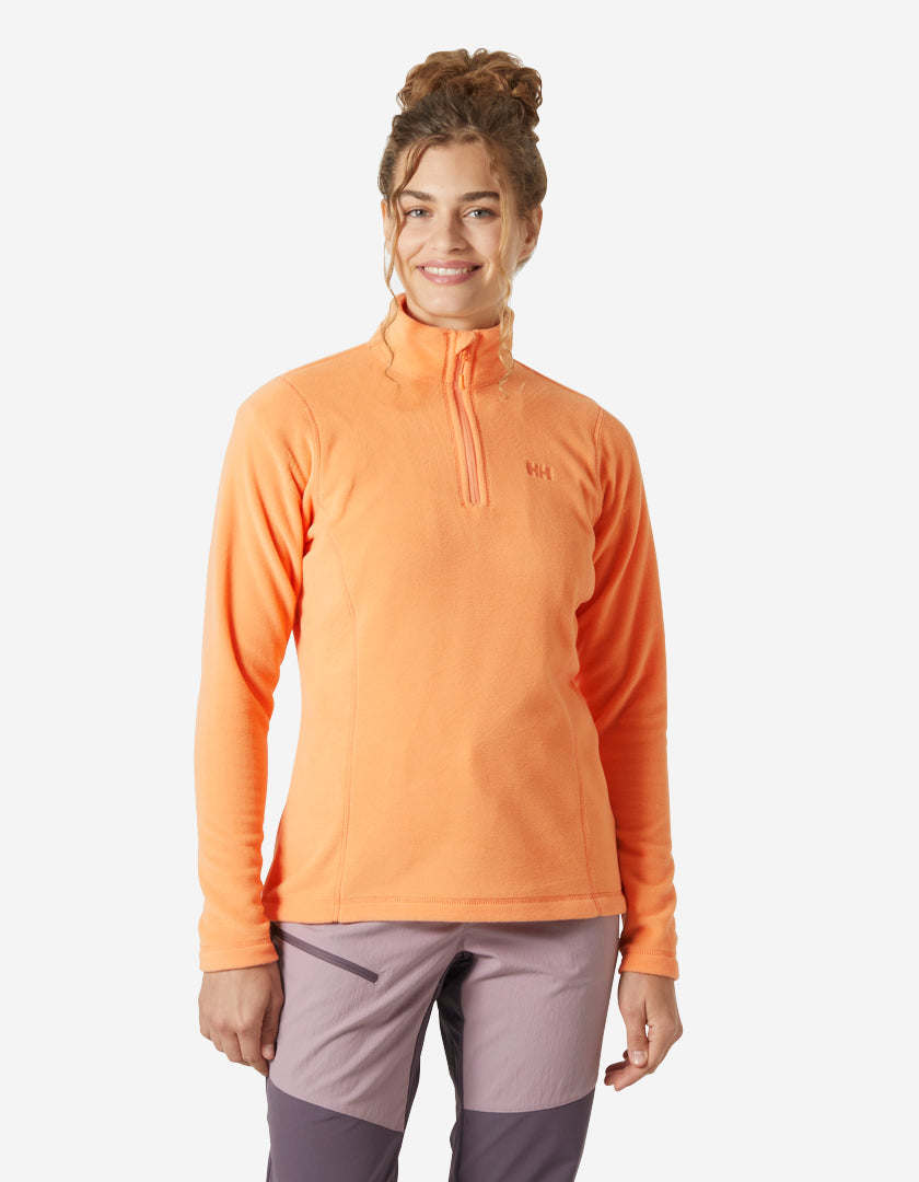 Image of a model wearing Outerwear. Product name - W DAYBREAKER 1/2 ZIP FLEECE, Apricot Crush in Apricot Crush colour by brand - Helly Hansen