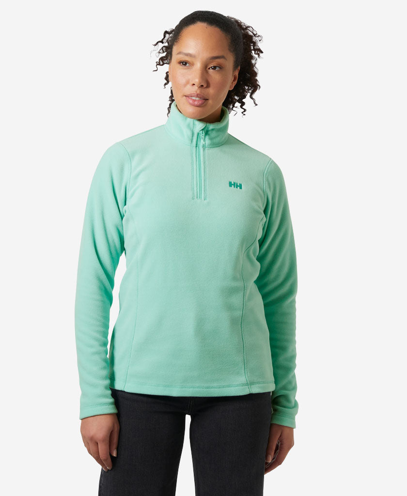 Image of a model wearing Outerwear. Product name - W DAYBREAKER 1/2 ZIP FLEECE, Lagoon in Lagoon colour by brand - Helly Hansen