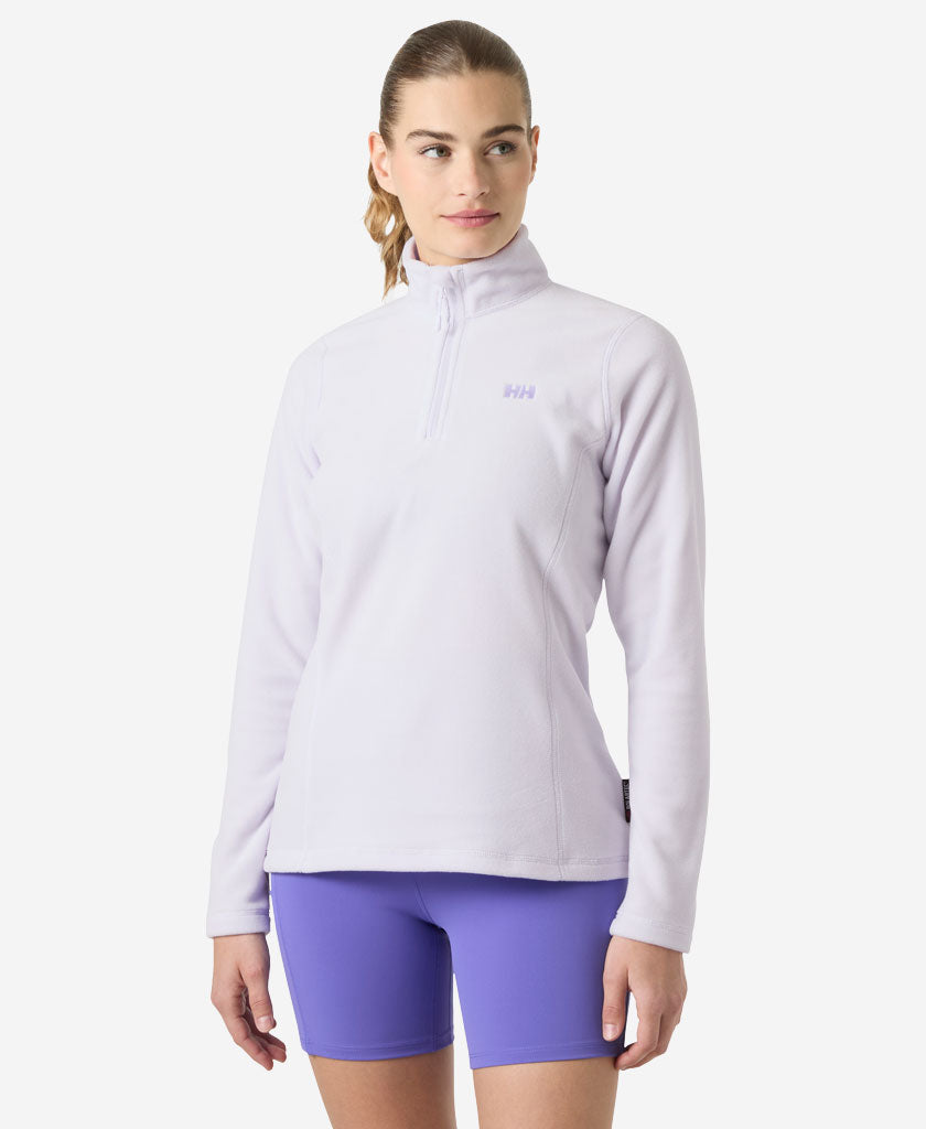 Image of a model wearing Outerwear. Product name - W DAYBREAKER 1/2 ZIP FLEECE, Even Light Purple in Even Light Purple colour by brand - Helly Hansen