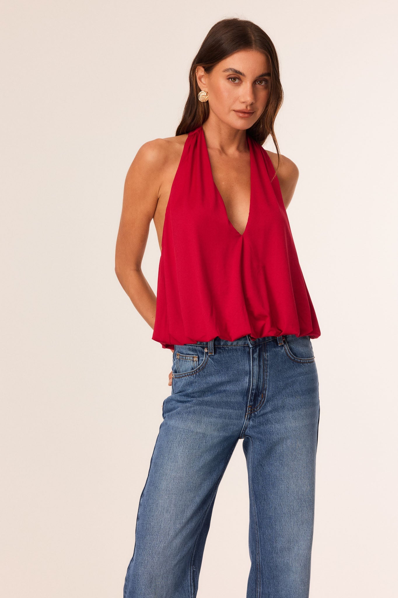 Image of a model wearing Tops. Productname: SNDYS TAKODA TOP in Red colour by brand - SNDYS