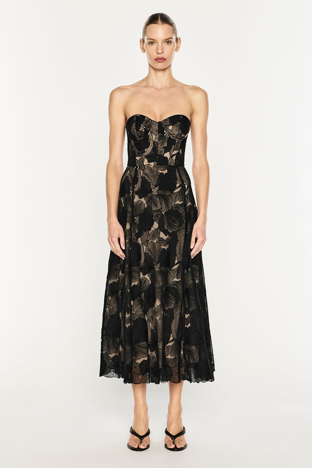 Image of Dresses. Product name - Sheer Force Strapless Dress in Black colour by brand - MANNING CARTELL