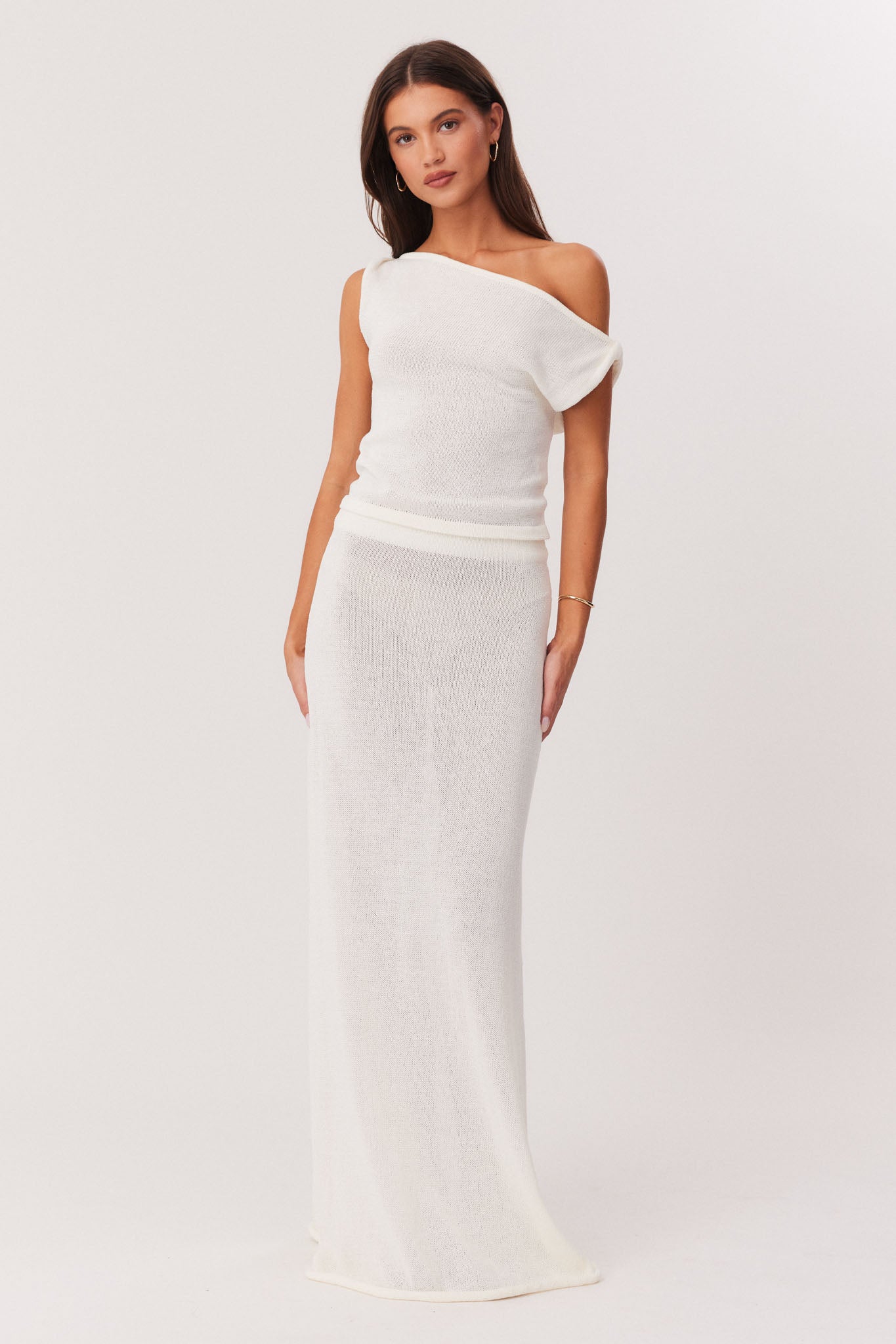 Image of a model wearing Skirts. Productname: SNDYS CALI MAXI SKIRT in Off White colour by brand - SNDYS