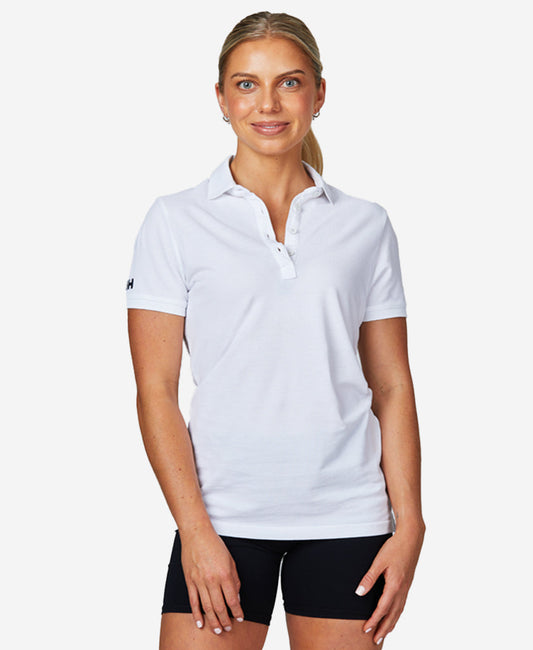 Image of a model wearing Tops. Product name - W CREW PIQUE 2 POLO, White in White colour by brand - Helly Hansen