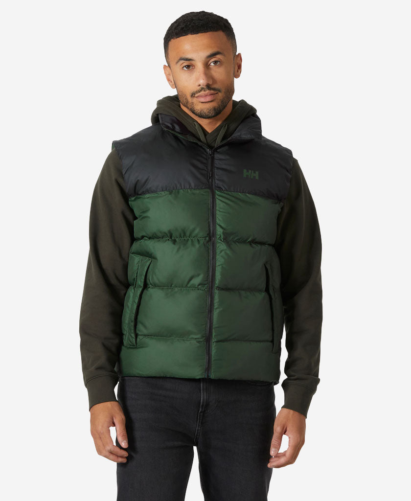 Image of a model wearing Outerwear. Product name - ACTIVE PUFFY VEST, Jungle Green in Jungle Green colour by brand - Helly Hansen