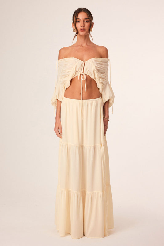 Image of a model wearing Skirts. Productname: SNDYS ABBEY MAXI SKIRT in Buttermilk colour by brand - SNDYS