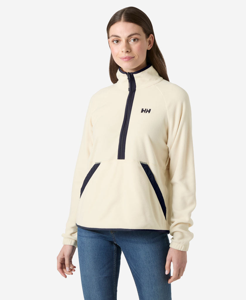 Image of a model wearing Outerwear. Product name - W RIG FLEECE 1/2 ZIP, 035 Cream in Cream colour by brand - Helly Hansen