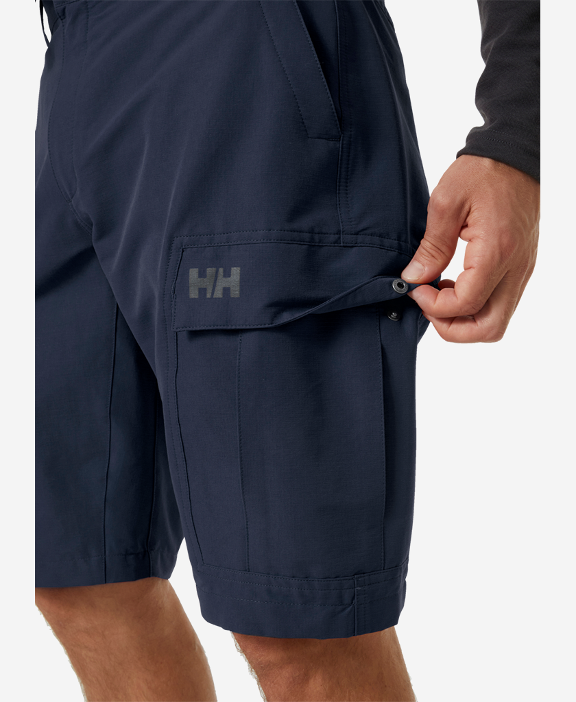 Image of a model wearing Shorts. Product name - HH QD CARGO SHORTS II, Navy in Navy colour by brand - Helly Hansen