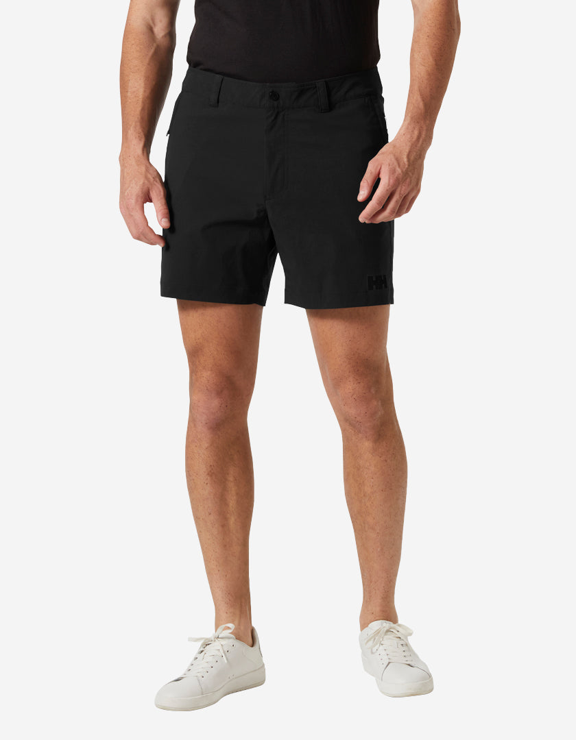 Image of a model wearing Shorts. Product name - MOVE QD 6" SHORTS, Black in Black colour by brand - Helly Hansen
