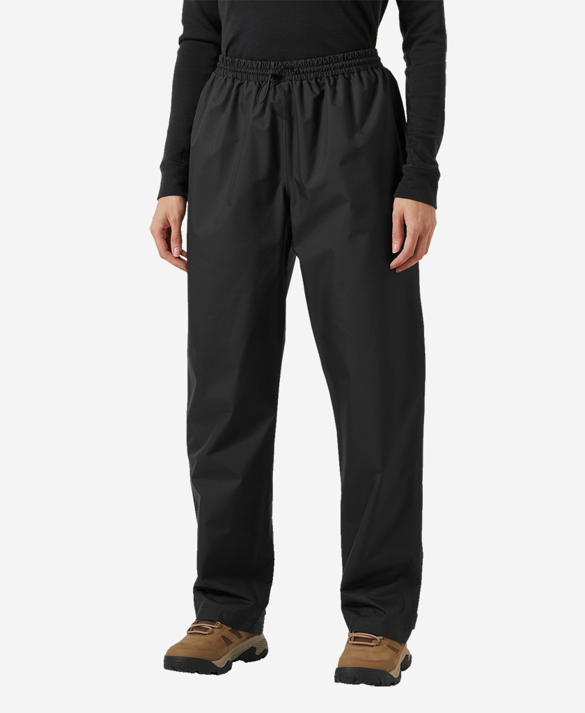 Image of a model wearing Pants. Product name - W HH RAIN PANT, Black in Black colour by brand - Helly Hansen