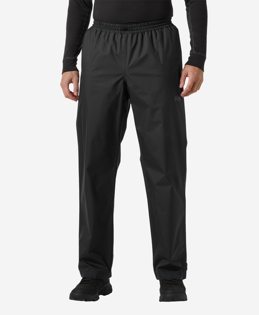 Image of a model wearing Pants. Product name - HH RAIN PANT, Black in Black colour by brand - Helly Hansen