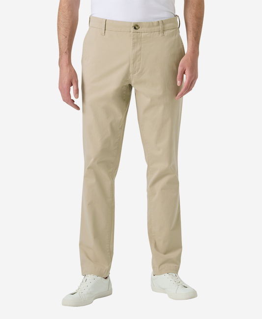 Image of a model wearing Pants. Product name - BRYGGEN CHINO PANT, Khaki in Khaki colour by brand - Helly Hansen