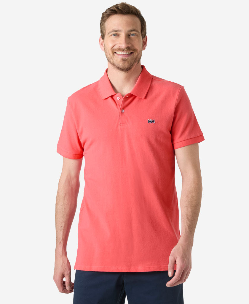 Image of a model wearing Tops. Product name - HUDSON POLO, Nantucket Red in Nantucket Red colour by brand - Helly Hansen