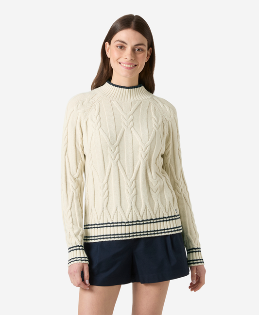 Image of a model wearing Outerwear. Product name - W POSITANO KNIT SWEATER, Cream in Cream colour by brand - Helly Hansen