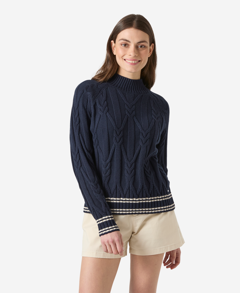 Image of a model wearing Outerwear. Product name - W POSITANO KNIT SWEATER, Navy in Navy colour by brand - Helly Hansen