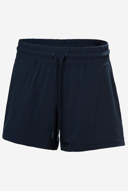 Image of a model wearing Shorts. Product name - W THALIA SHORTS 4", Navy in Navy colour by brand - Helly Hansen