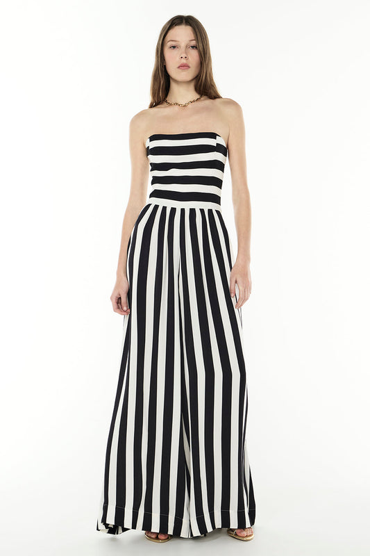 Image of a model wearing Outerwear. Productname: New Beat Jumpsuit in BLACK/WHITE colour by brand - Manning Cartell