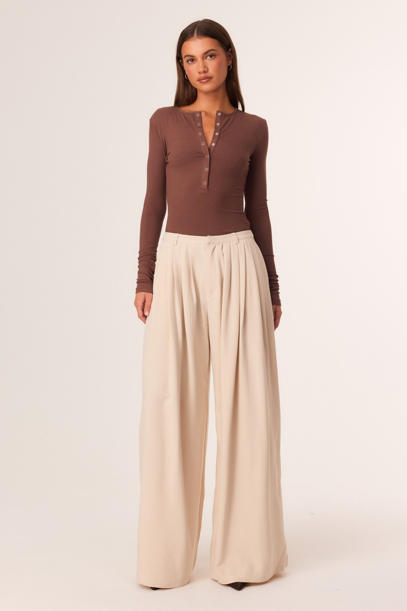 Image of a model wearing Pants. Productname: SNDYS EVELINA PANTS in Bone colour by brand - SNDYS