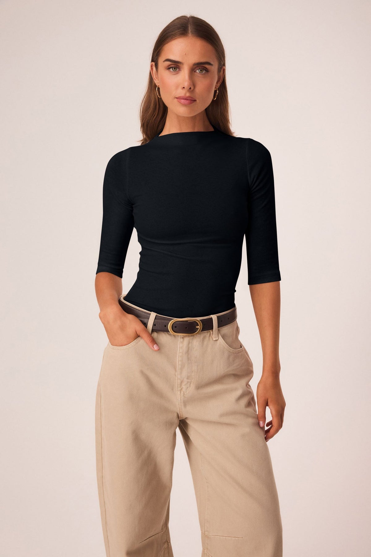 Image of a model wearing Tops. Productname: SNDYS KATYA 3/4 SLEEVE TOP in Black colour by brand - SNDYS