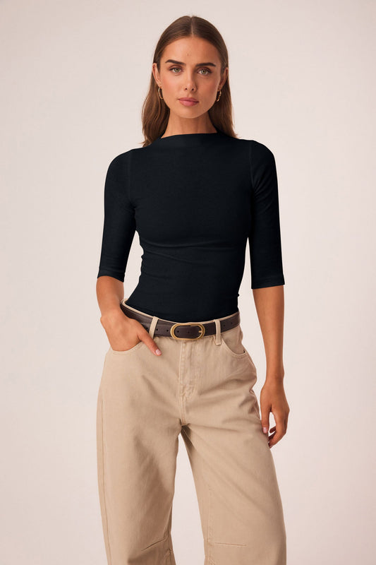 Image of a model wearing Tops. Productname: SNDYS KATYA 3/4 SLEEVE TOP in Black colour by brand - SNDYS