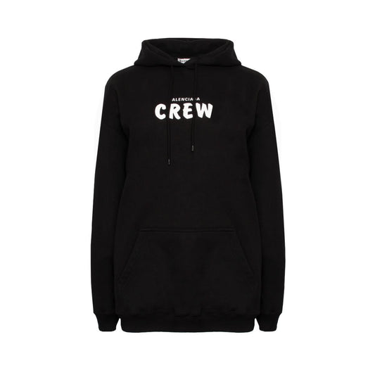 Image of a model wearing Outerwear. Productname: BALENCIAGA Crew Logo Hoodie in Black colour by brand - BALENCIAGA
