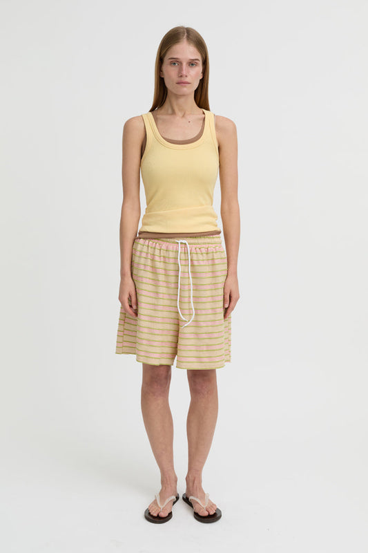 Image of a model wearing Shorts. Product name - Wynn Shorts Beige in Beige colour by brand - Blanca Studio